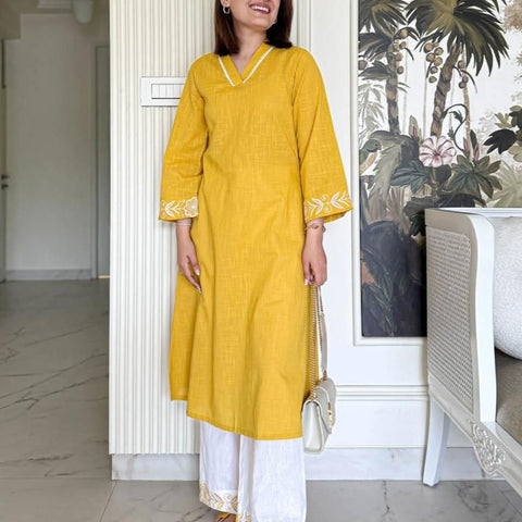 Women Mustard Solid Cotton Flex V-Neck A-Line Kurta Pant Set
